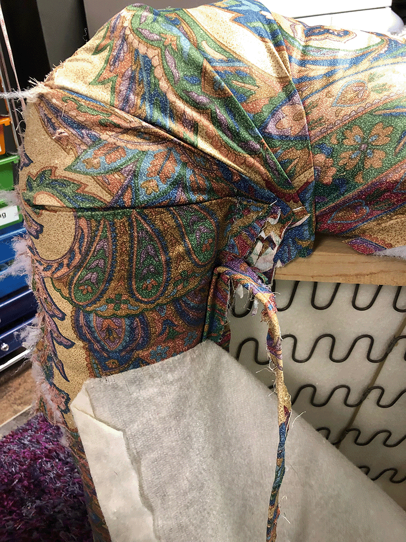 Back Panel - Opened - Piping and webbing Anchor print pillow with piping ends pinned